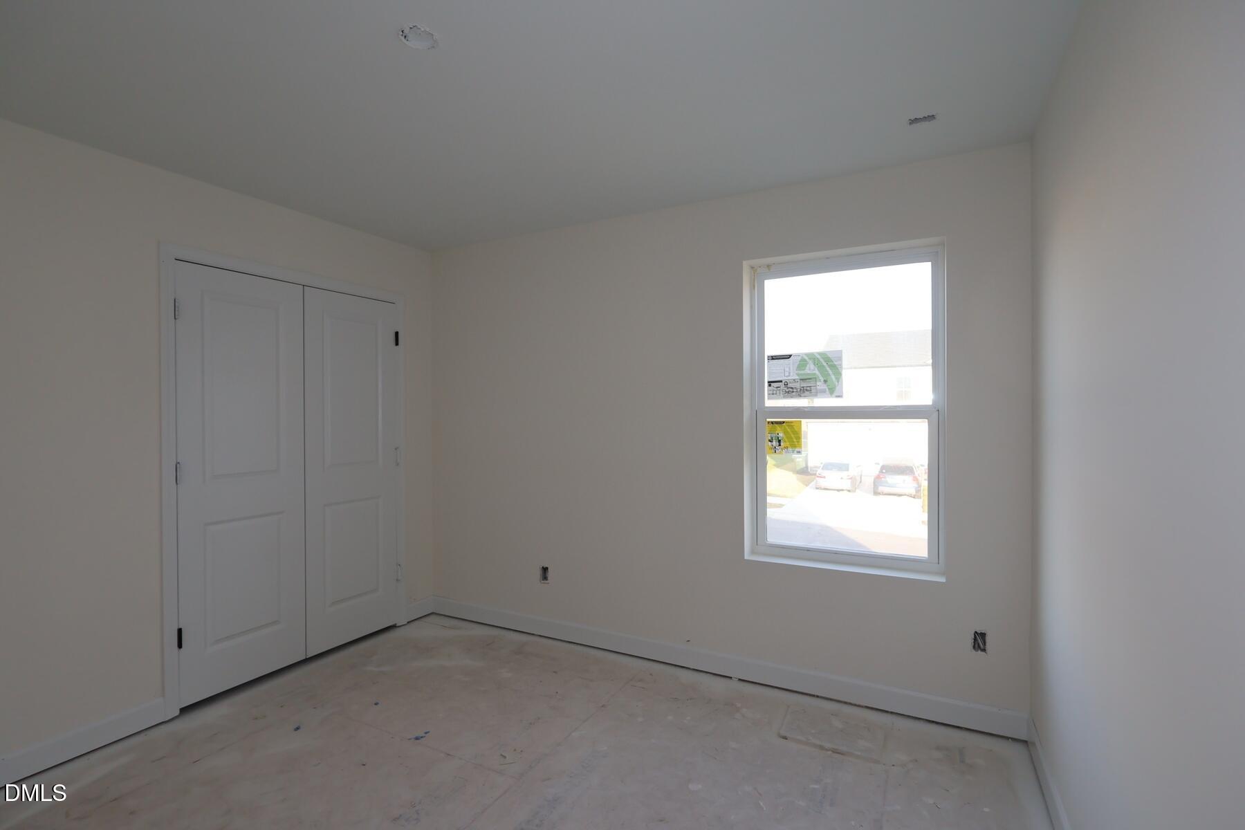 1321 Dimaggio Drive Raleigh, NC 27616 - Photo 20 of 28 an empty room with a window