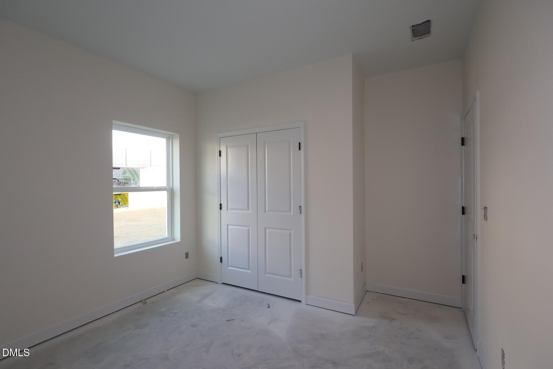 1321 Dimaggio Drive Raleigh, NC 27616 - Photo 21 of 28 a view of an empty room with a window