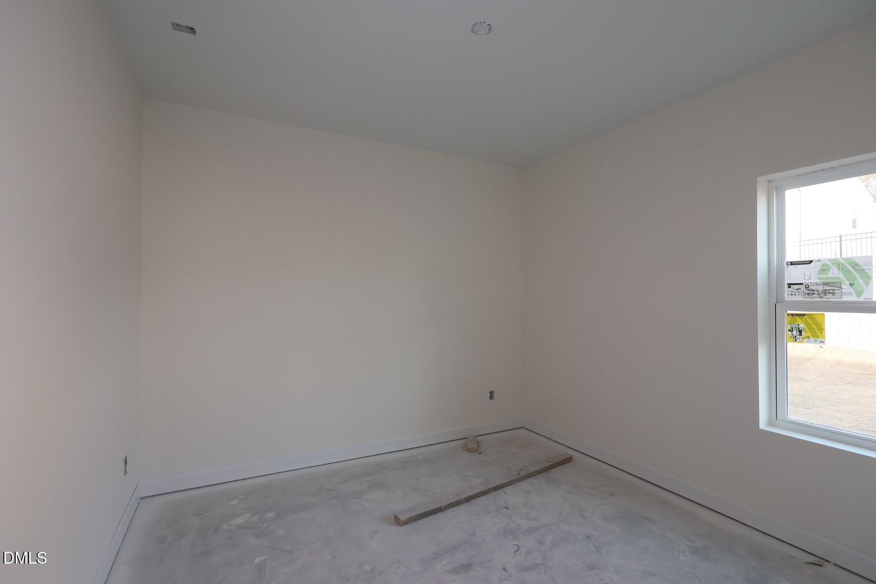1321 Dimaggio Drive Raleigh, NC 27616 - Photo 22 of 28 an empty room with a window