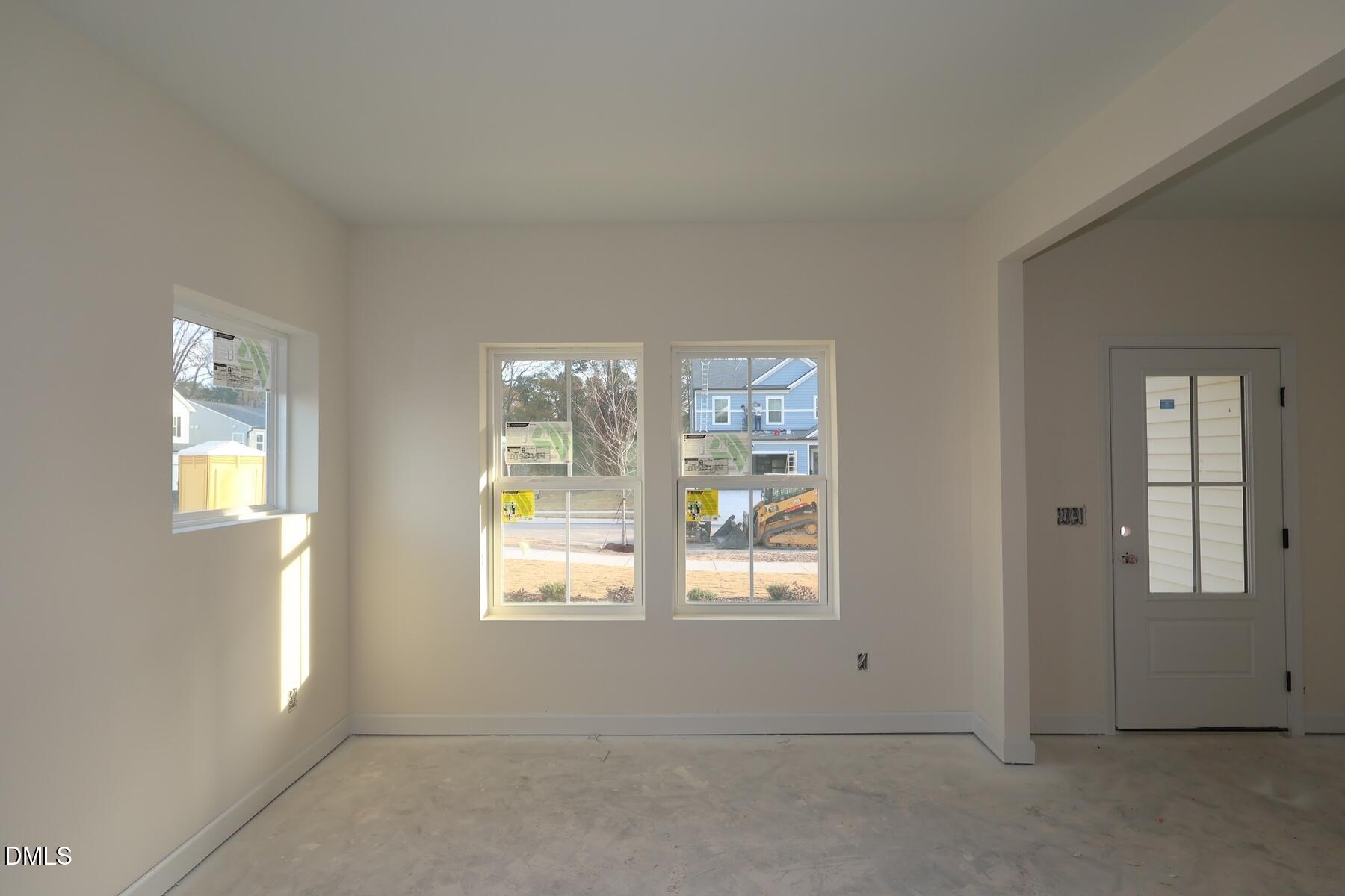 1321 Dimaggio Drive Raleigh, NC 27616 - Photo 25 of 28 an empty room with windows