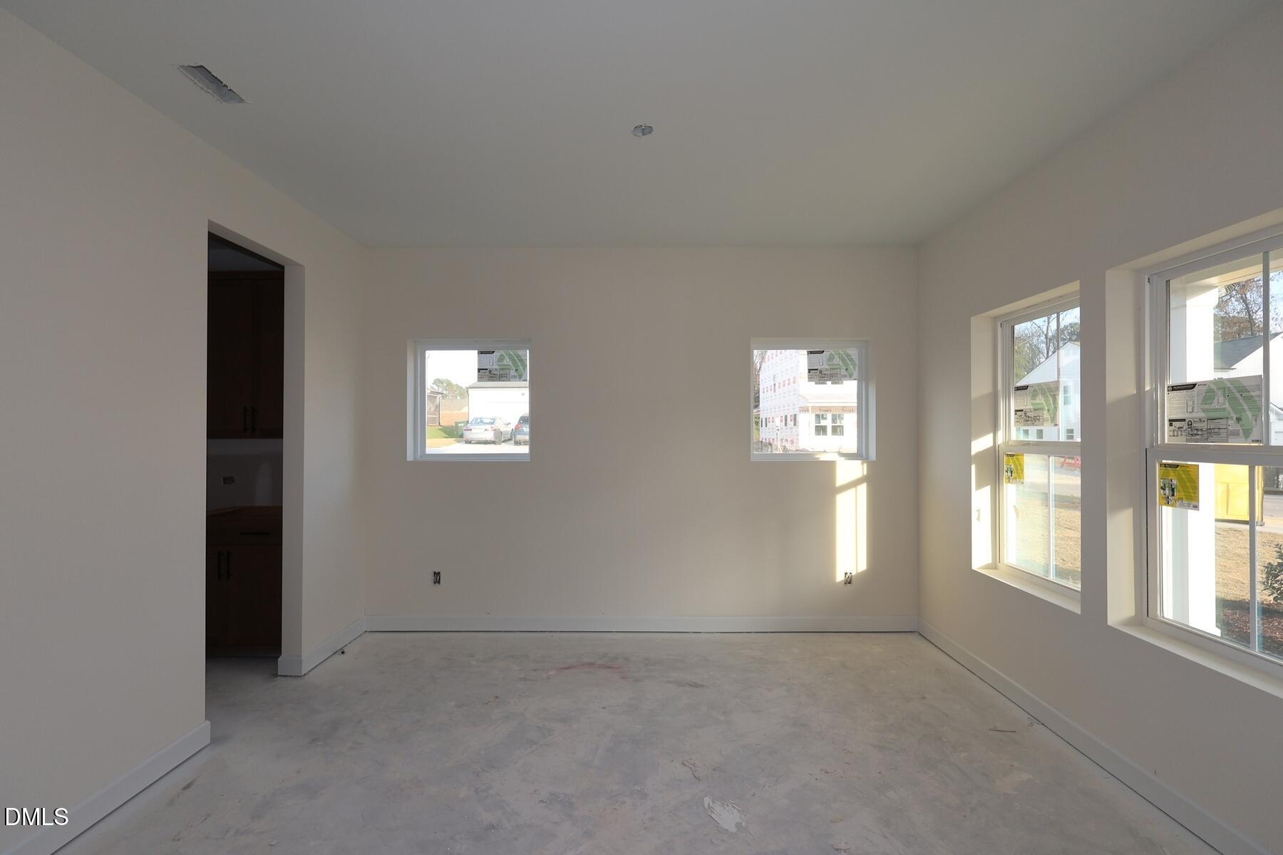 1321 Dimaggio Drive Raleigh, NC 27616 - Photo 26 of 28 a view of an empty room with a window