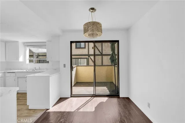 a view of a hallway with windows