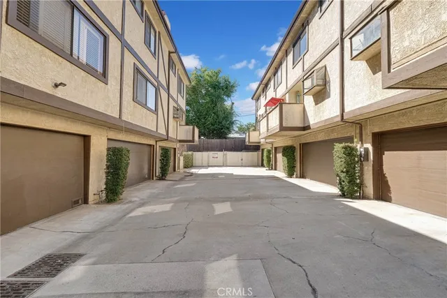 a view of a building with a street