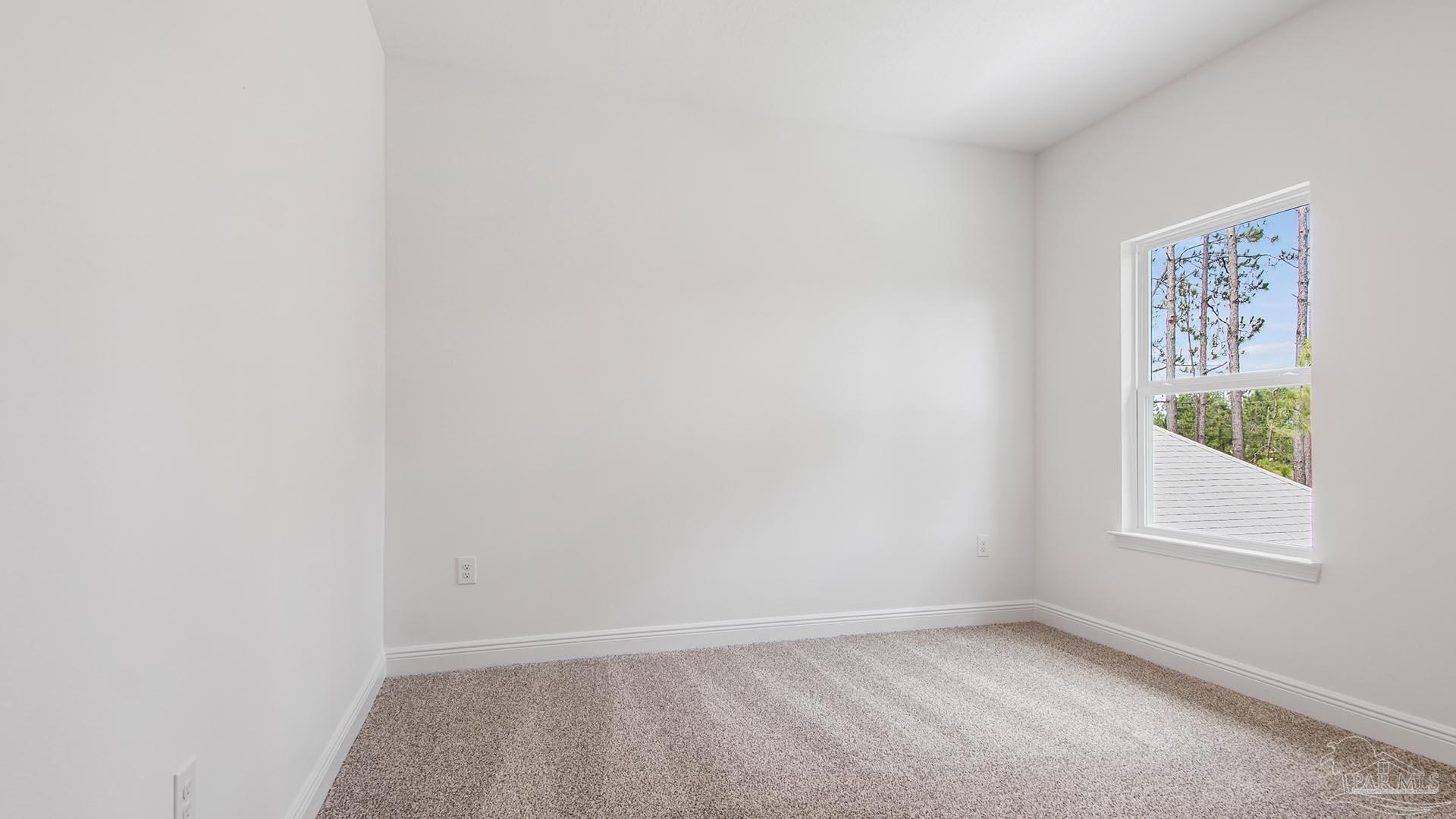 3233 Harrier Road Pace, FL 32571 - Photo 18 of 50 an empty room with a window