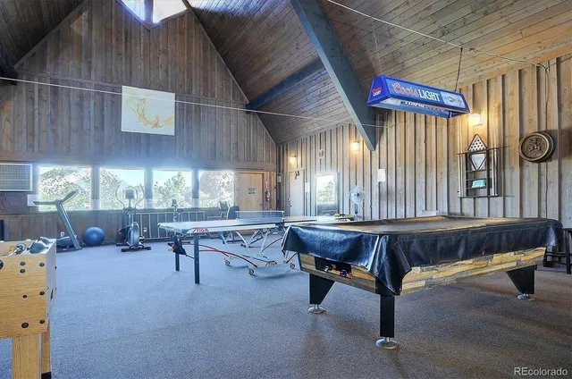 a room with furniture a window and a table