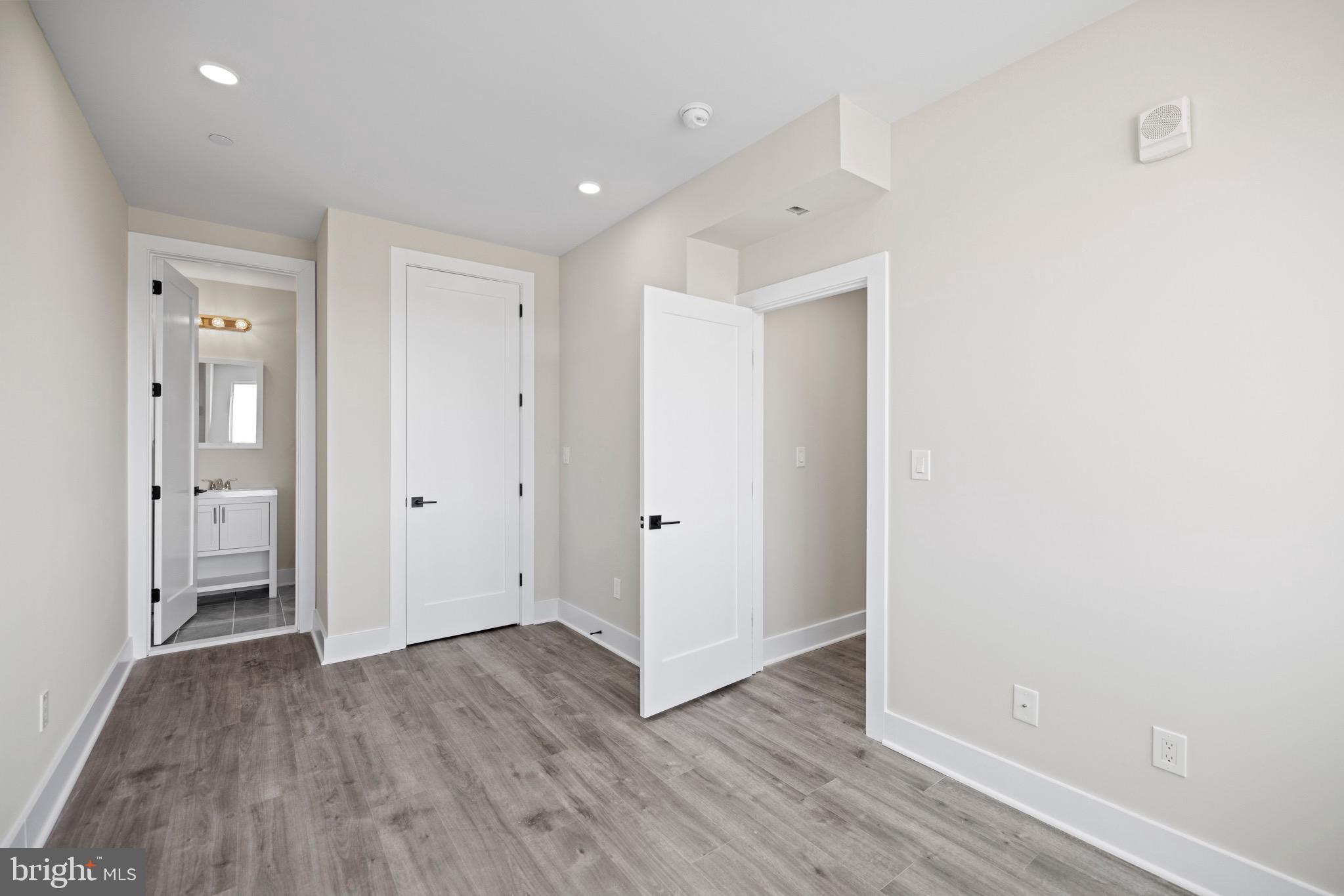 824 18th Street Northeast, Unit 12 Washington, DC 20002 - Photo 7 of 25 a view of an empty room with wooden floor