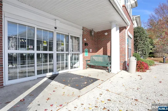 a view of a backyard with a sitting area