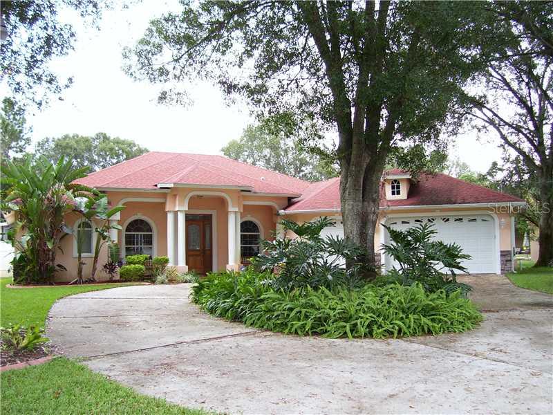 3319 Moran Road Tampa, FL 33618 - Photo 1 of 1 Exterior Front - Gorgeous home situated on over 1/2 acre. Caged pool. Three car garage. Energy efficient construction.