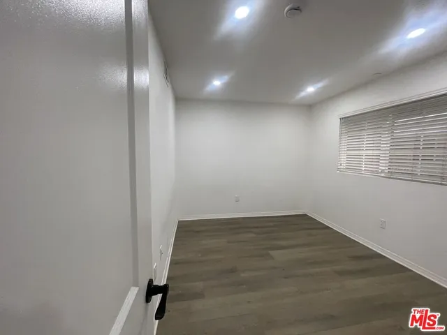 a bathroom with a shower toilet and sink