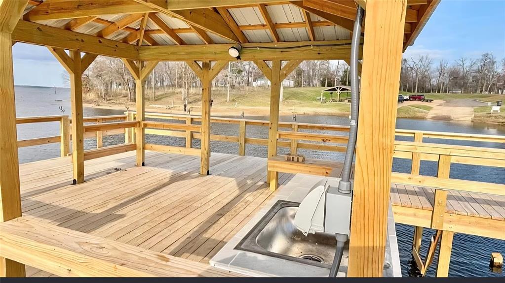 405 Broken Bow Quitman, TX 75783 - Photo 28 of 33 Dock area featuring a deck with water view