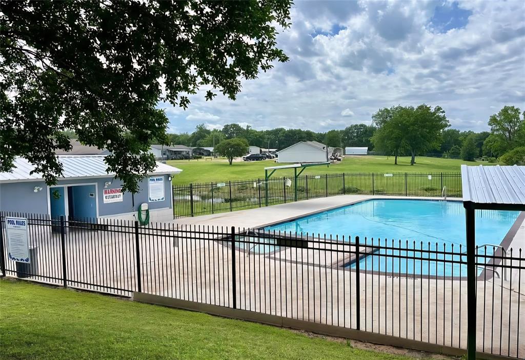 405 Broken Bow Quitman, TX 75783 - Photo 30 of 33 Community pool featuring a patio