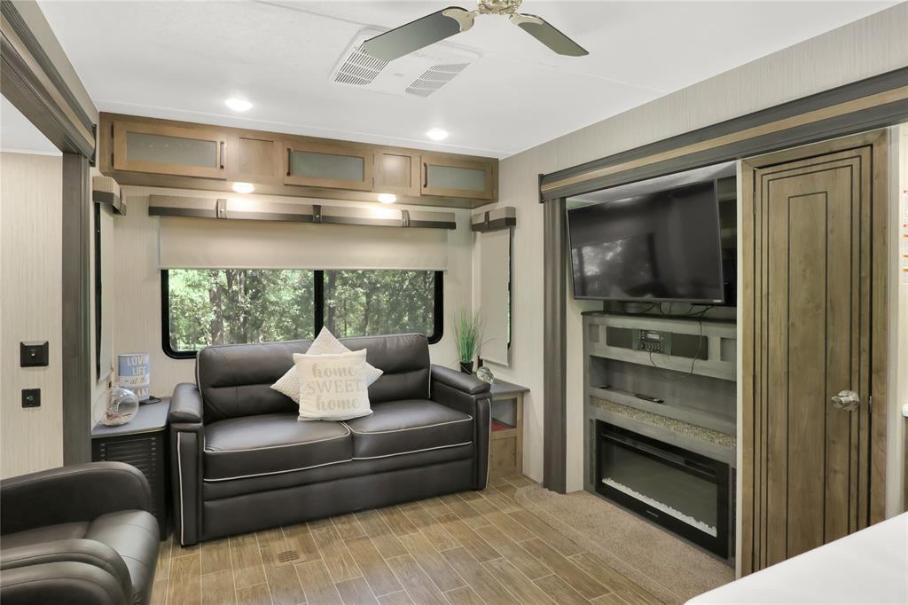 405 Broken Bow Quitman, TX 75783 - Photo 4 of 33 Pull out couch, 2 recliners and a fireplace