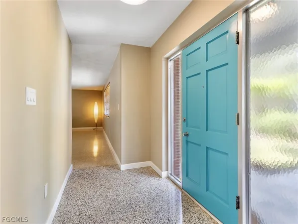 a large kitchen with stainless steel appliances granite countertop a sink and a stove