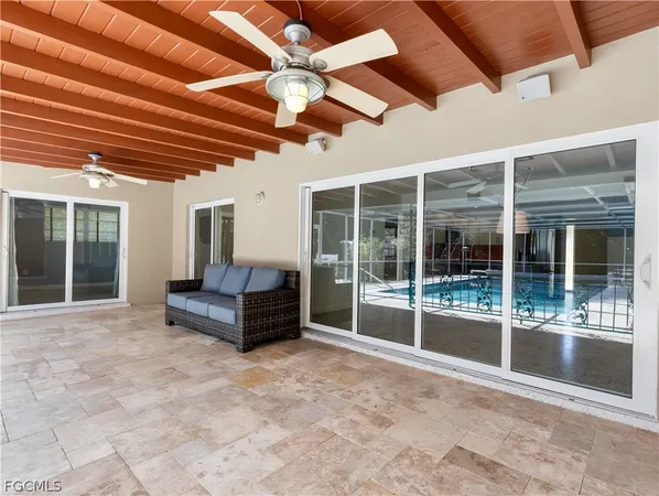 a view of a swimming pool with a porch