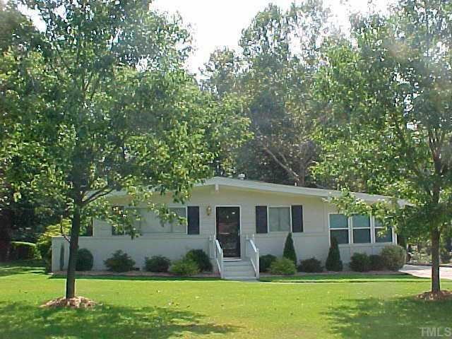 3516 Baugh Street Raleigh, NC 27604 - Photo 1 of 1 a front view of house with yard and green space