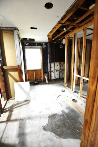 a view of a room with a large window