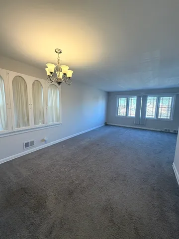a view of a livingroom with a chandelier
