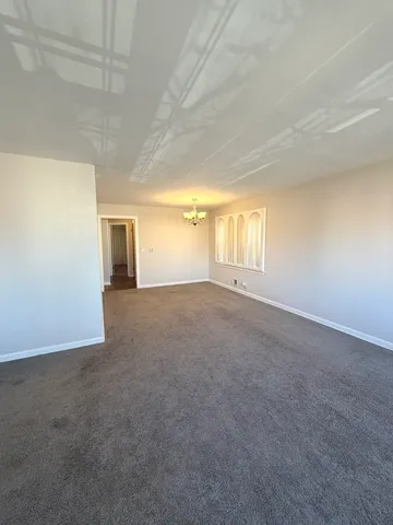 a view of an empty room with window