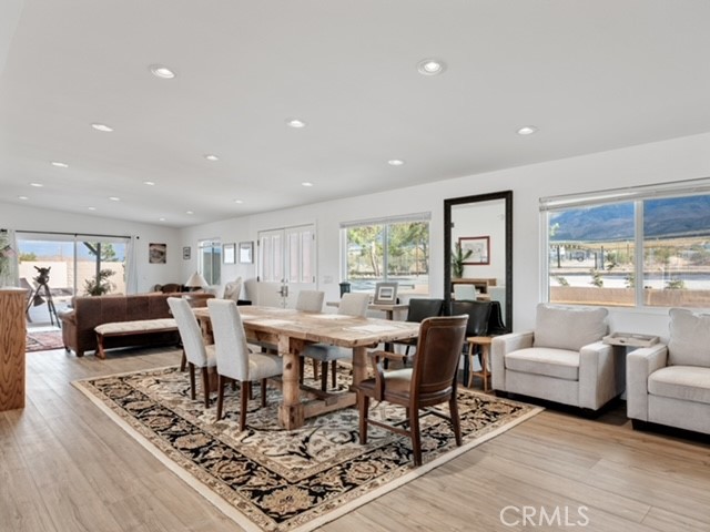 30280 Santa Rosa Road Lucerne Valley, CA 92356 - Photo 45 of 61 a view of a dining room with furniture window and wooden floor