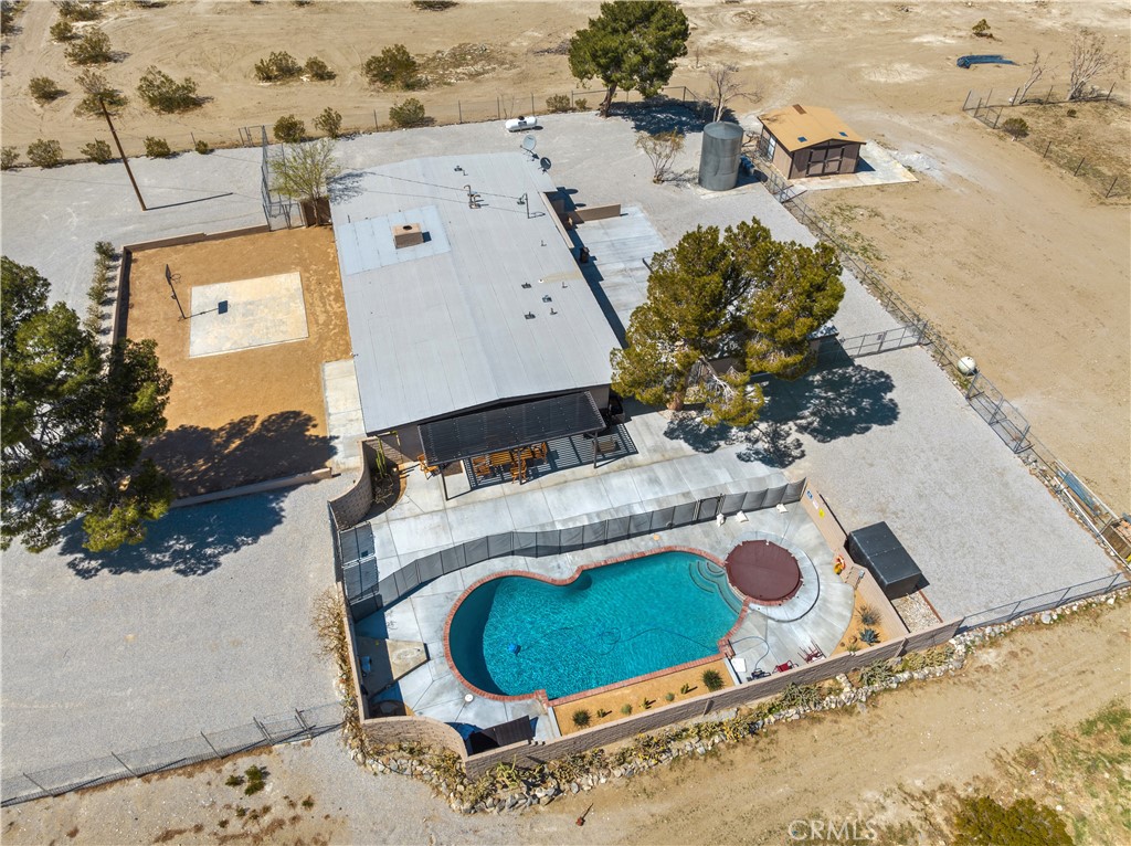 30280 Santa Rosa Road Lucerne Valley, CA 92356 - Photo 57 of 61 an aerial view of a house with a swimming pool