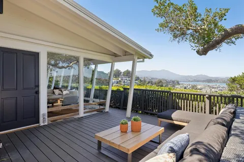 a outdoor living space with furniture and garden view