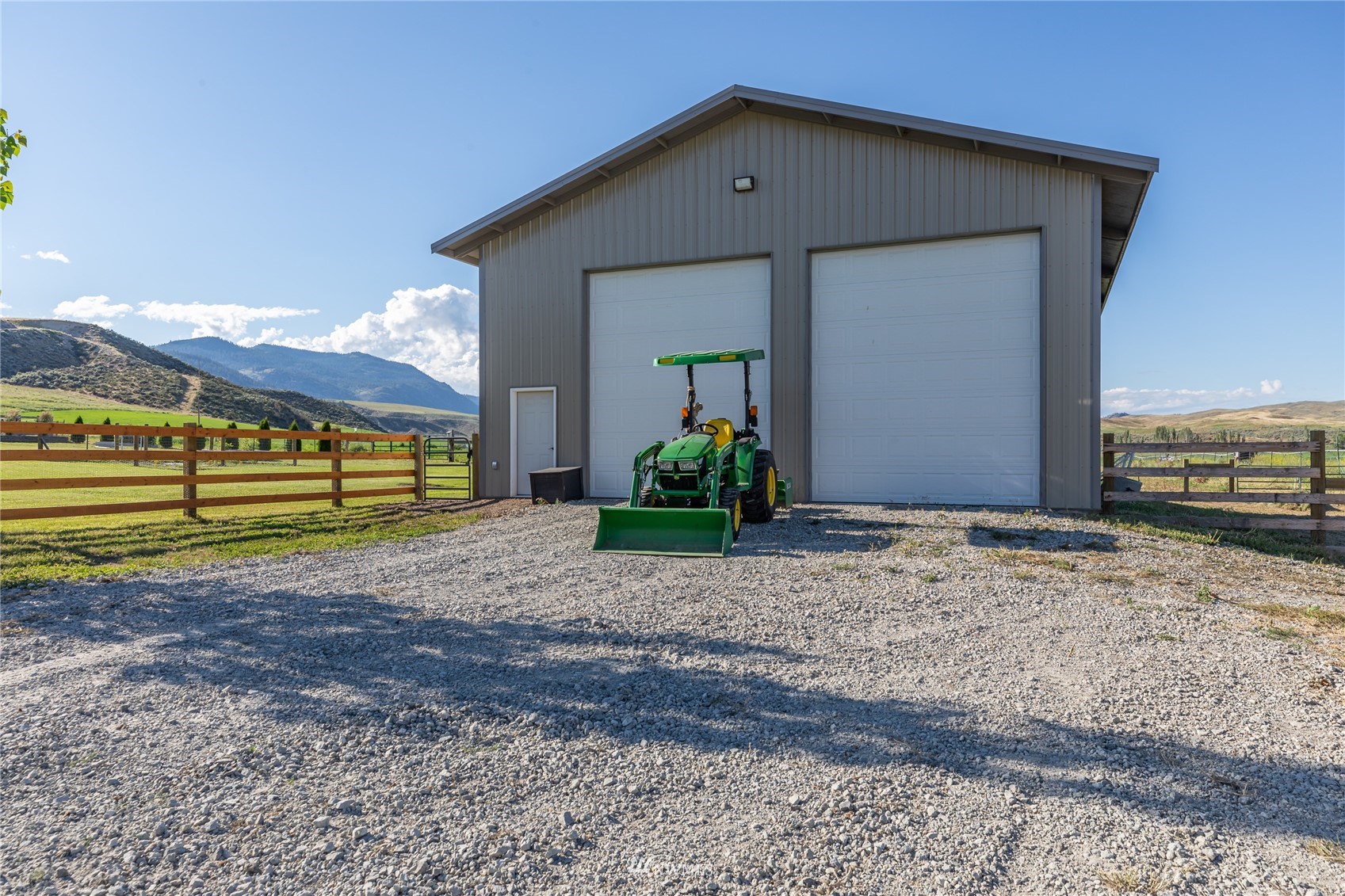57 Alvarado Road Tonasket, WA 98855 - Photo 29 of 39 a view of a house with a yard