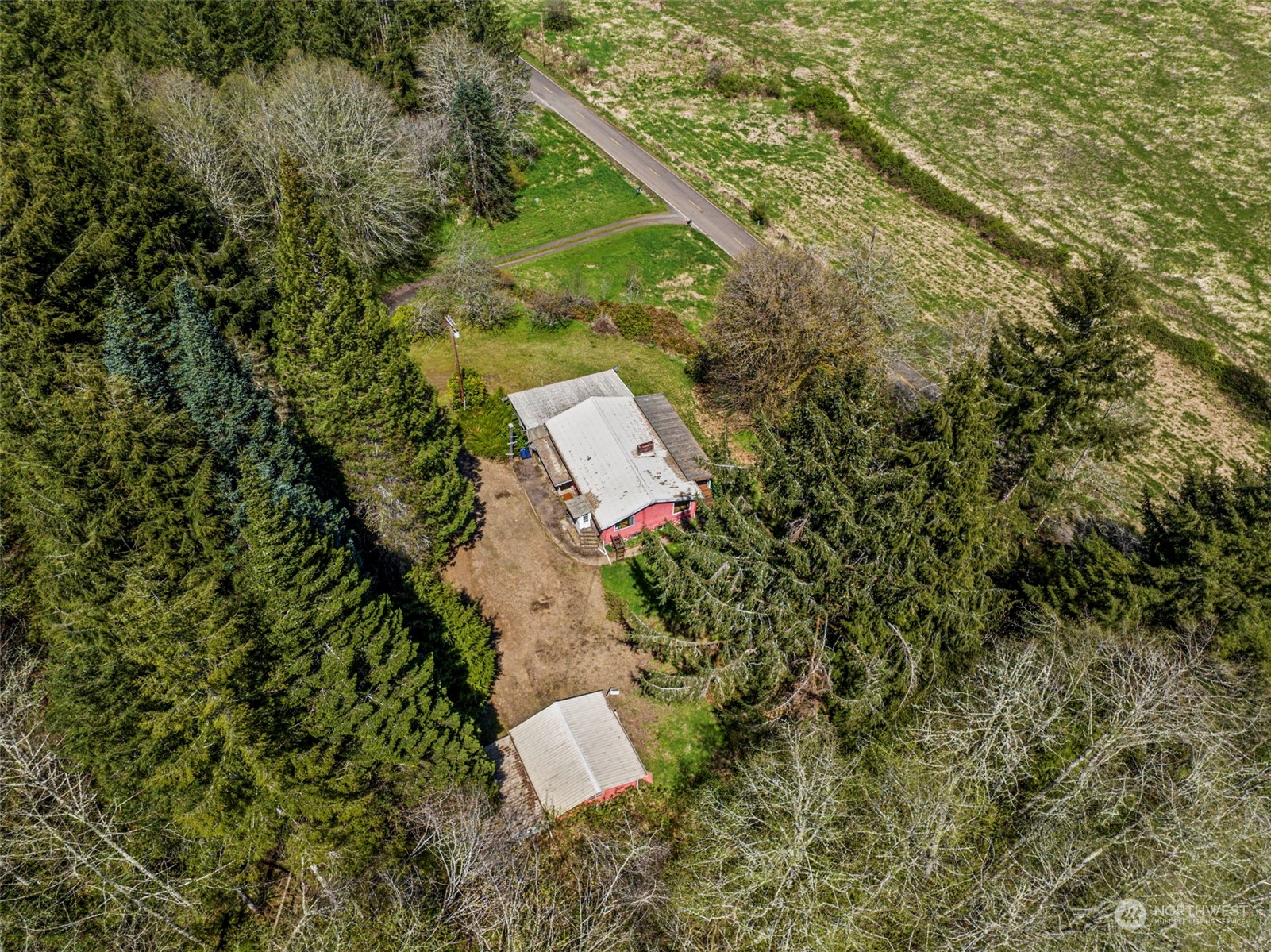 273 Middle Valley Road Skamokawa, WA 98647 - Photo 11 of 30 an aerial view of a house with a yard and trees