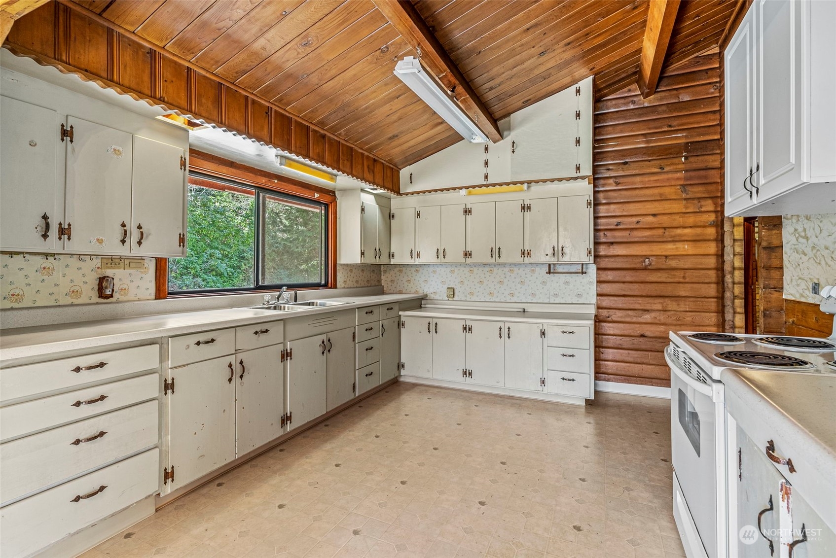 273 Middle Valley Road Skamokawa, WA 98647 - Photo 15 of 30 a kitchen that has a lot of cabinets in it