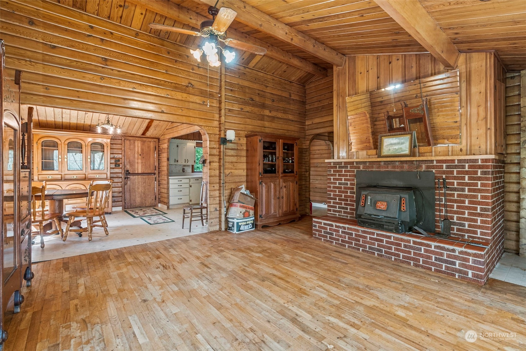273 Middle Valley Road Skamokawa, WA 98647 - Photo 20 of 30 a view of a livingroom with wooden floor and a outdoor space