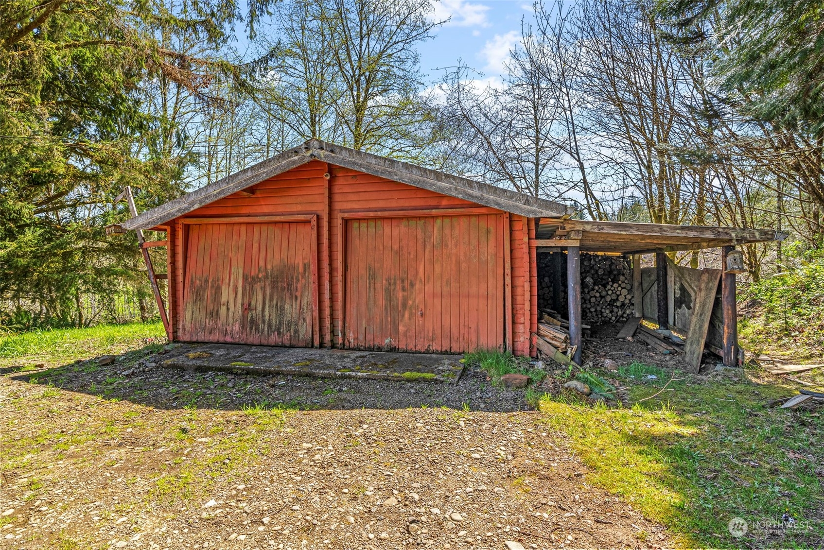 273 Middle Valley Road Skamokawa, WA 98647 - Photo 30 of 30 a view of a small house in the middle of a yard