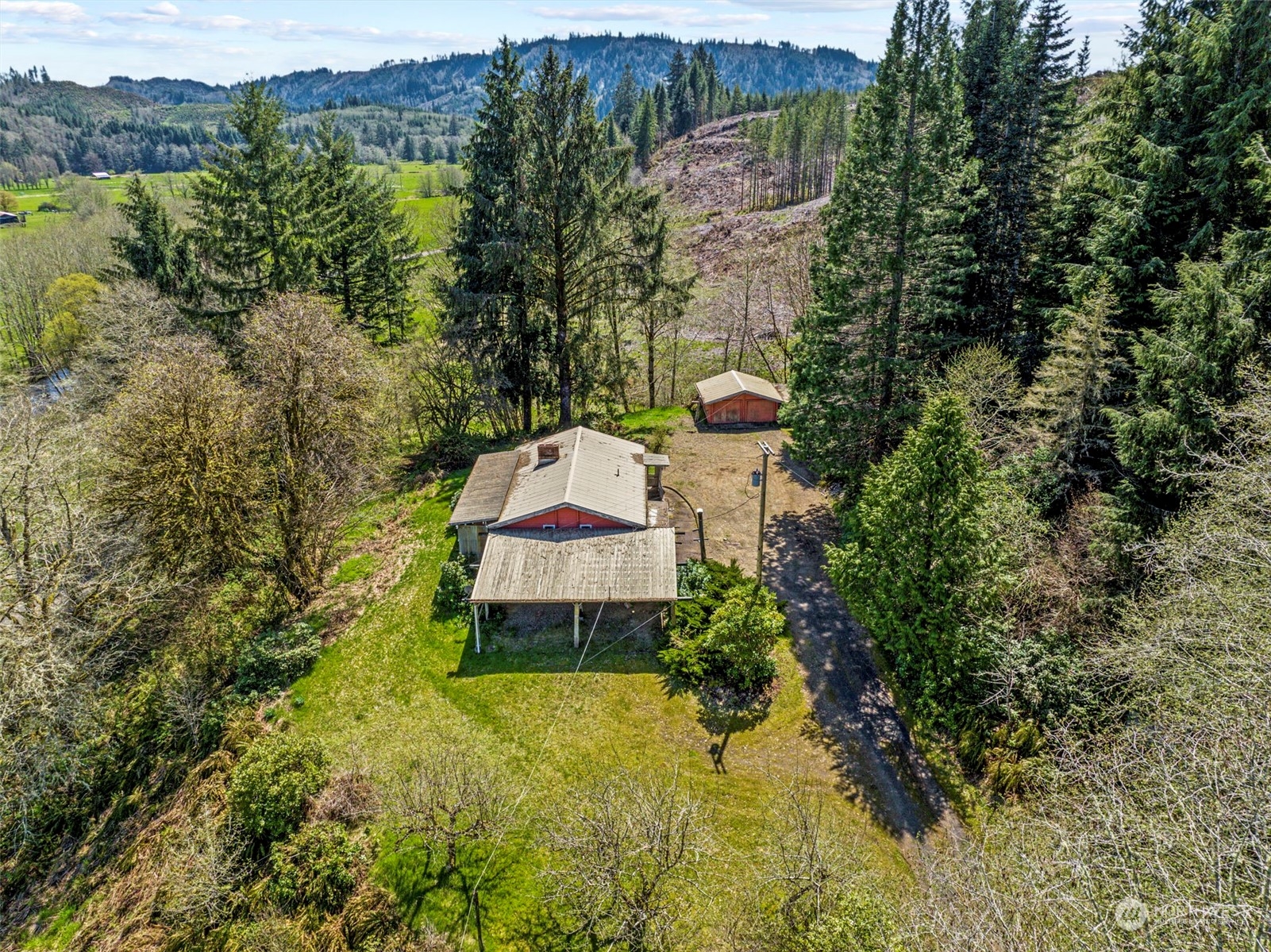 273 Middle Valley Road Skamokawa, WA 98647 - Photo 8 of 30 a flower garden is sitting in the middle of a lake