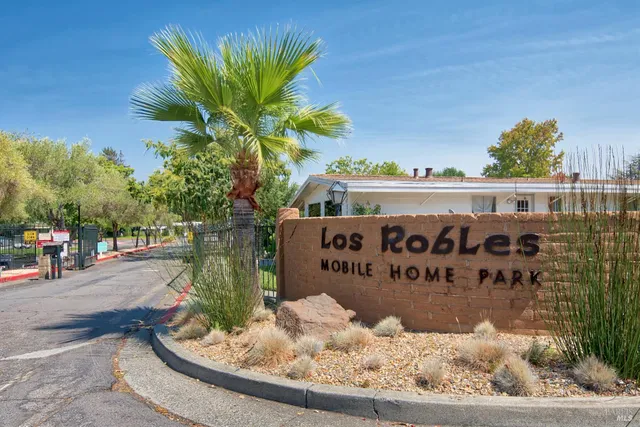 a sign that is on the side of the road