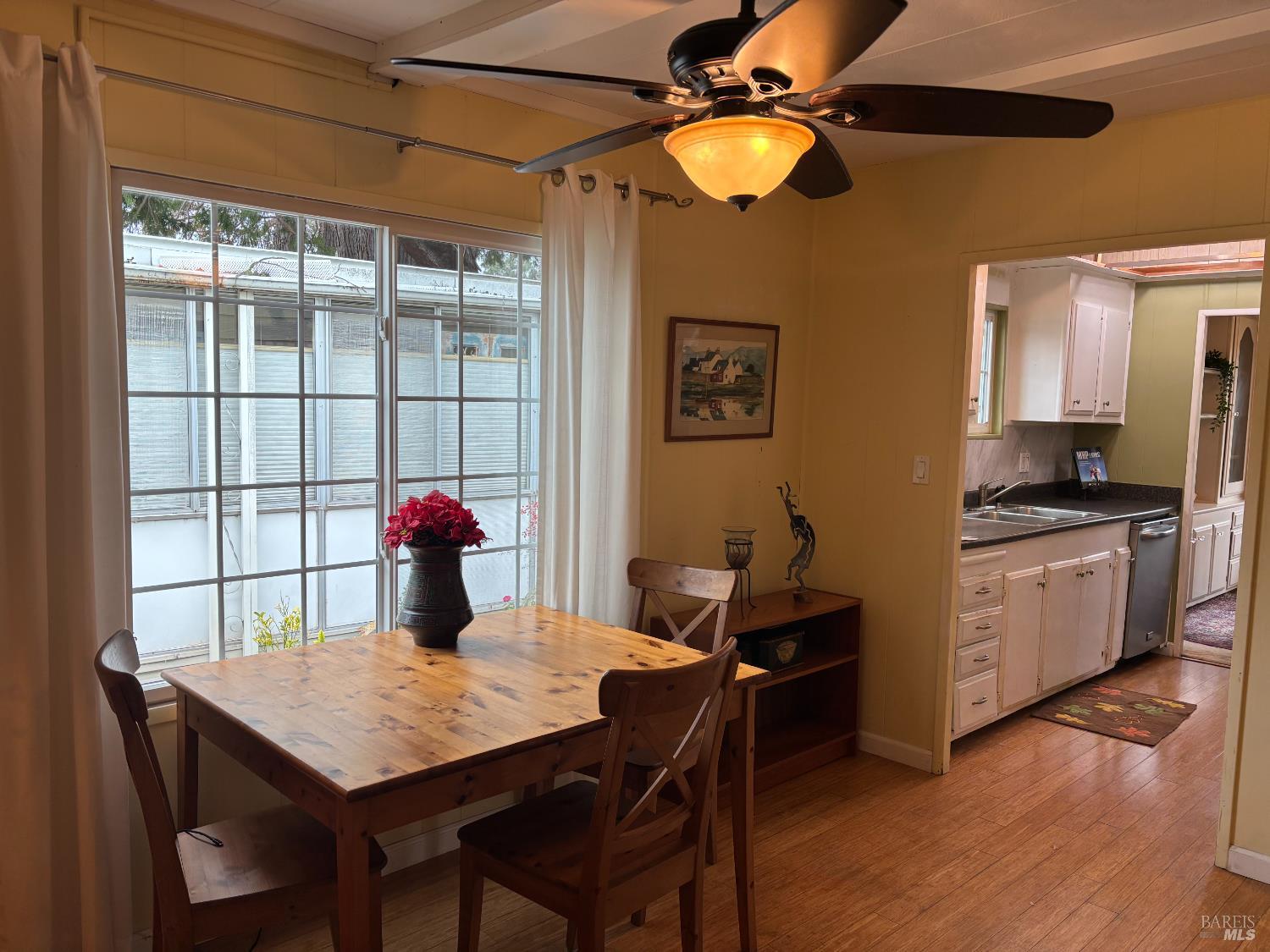 10 Oceano Place Novato, CA 94949 - Photo 5 of 20 a view of a dining room with furniture and wooden floor