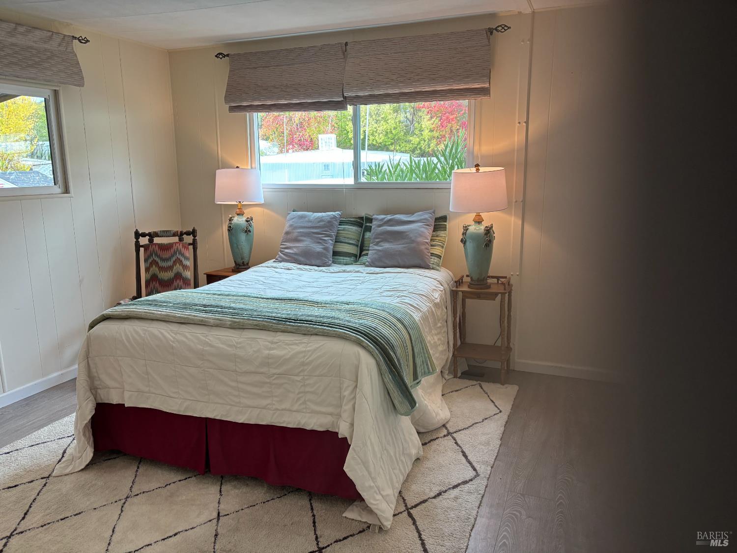 10 Oceano Place Novato, CA 94949 - Photo 9 of 20 a bedroom with a bed and a window