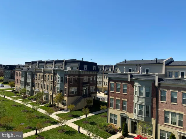 a view of an empty room and fire place