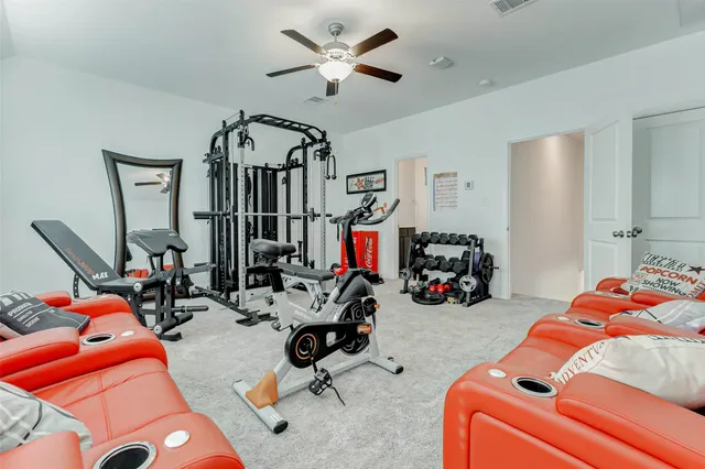 a bathroom with a granite countertop sink toilet and a mirror