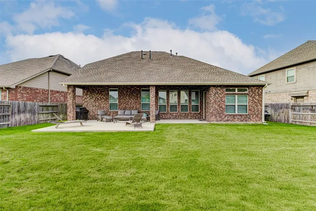 a house view with a garden space