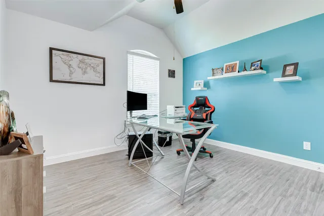 a workspace with wooden floor