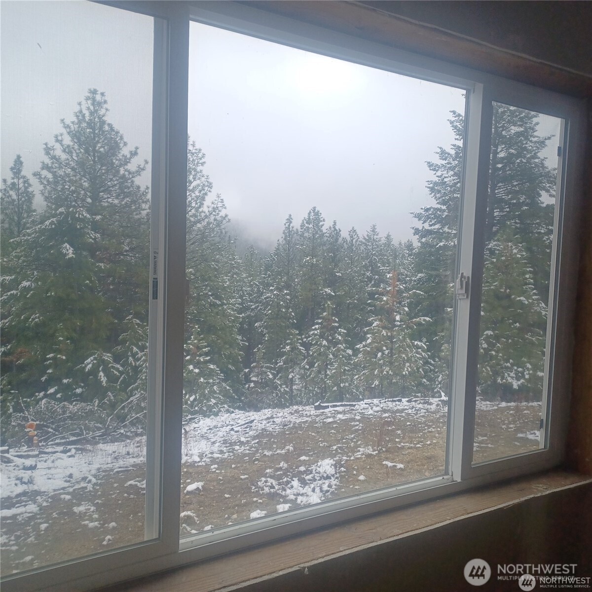 100 Turner Lake Road North Tonasket, WA 98855 - Photo 14 of 39 a view of a glass door and a window