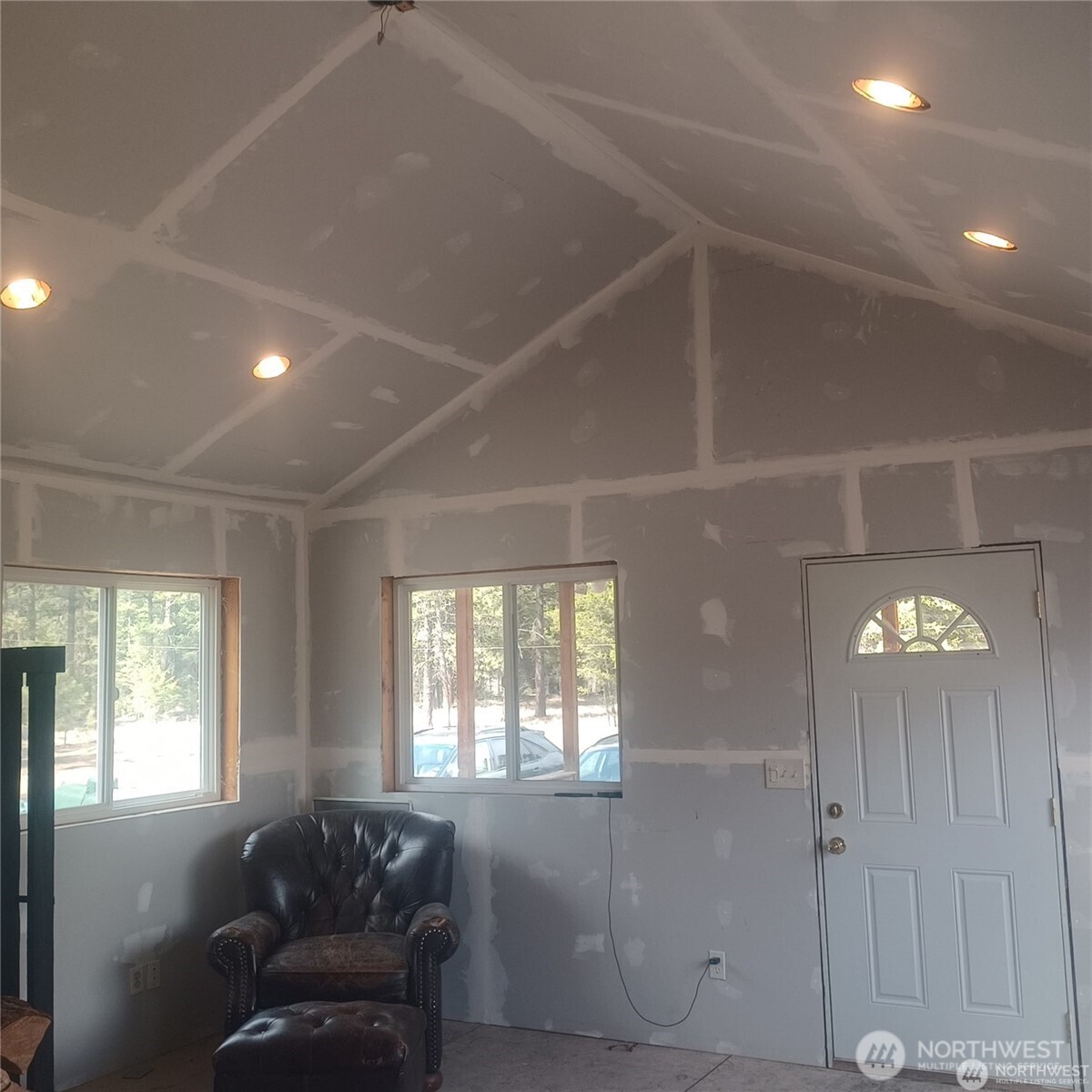 100 Turner Lake Road North Tonasket, WA 98855 - Photo 4 of 39 a living room with furniture and windows