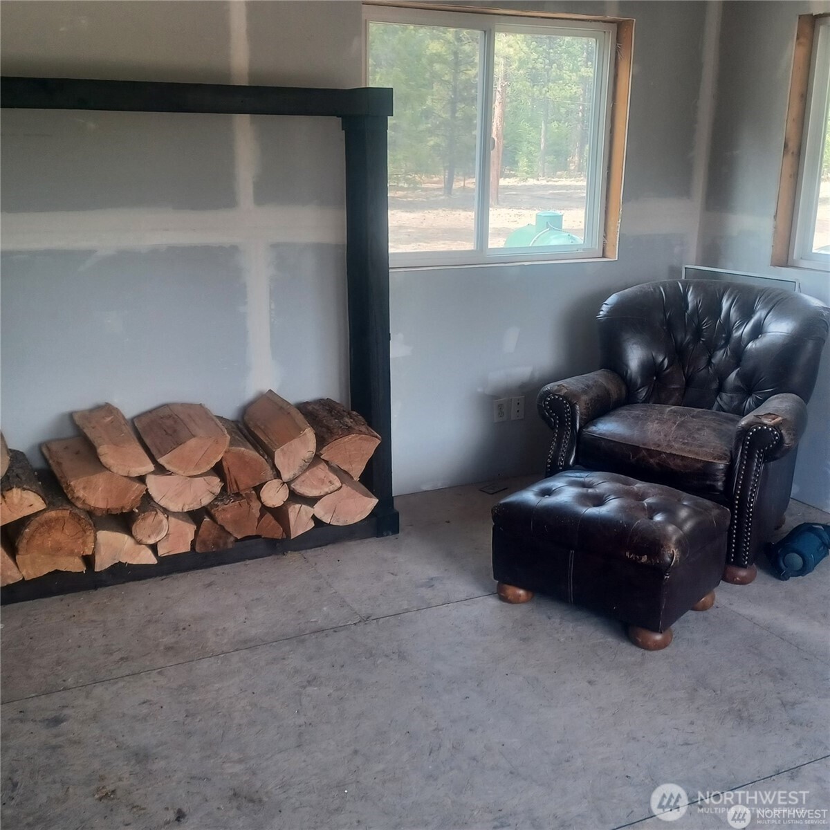 100 Turner Lake Road North Tonasket, WA 98855 - Photo 5 of 39 a living room with furniture and a window