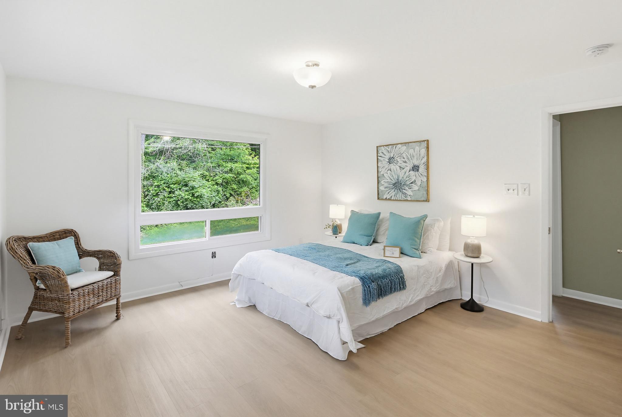 6702 Whitegate Road Clarksville, MD 21029 - Photo 15 of 52 Serene bedroom with nature views.