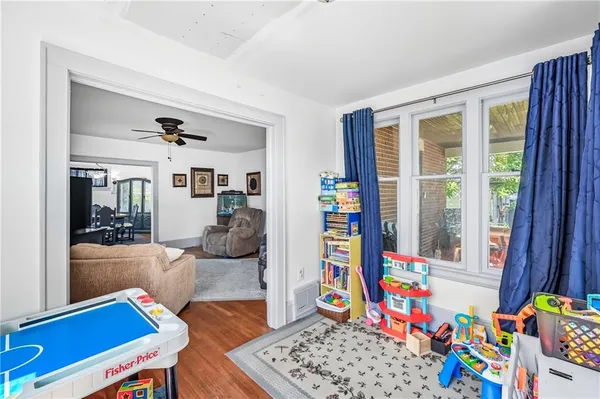 a room that has a bed and a window