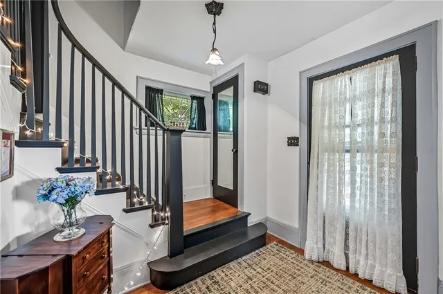 a view of entryway with wooden floor
