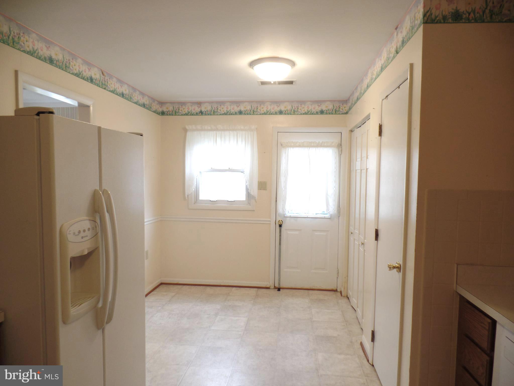 7403 Paxton Road Falls Church, VA 22043 - Photo 5 of 9 a view of a livingroom with a staircase
