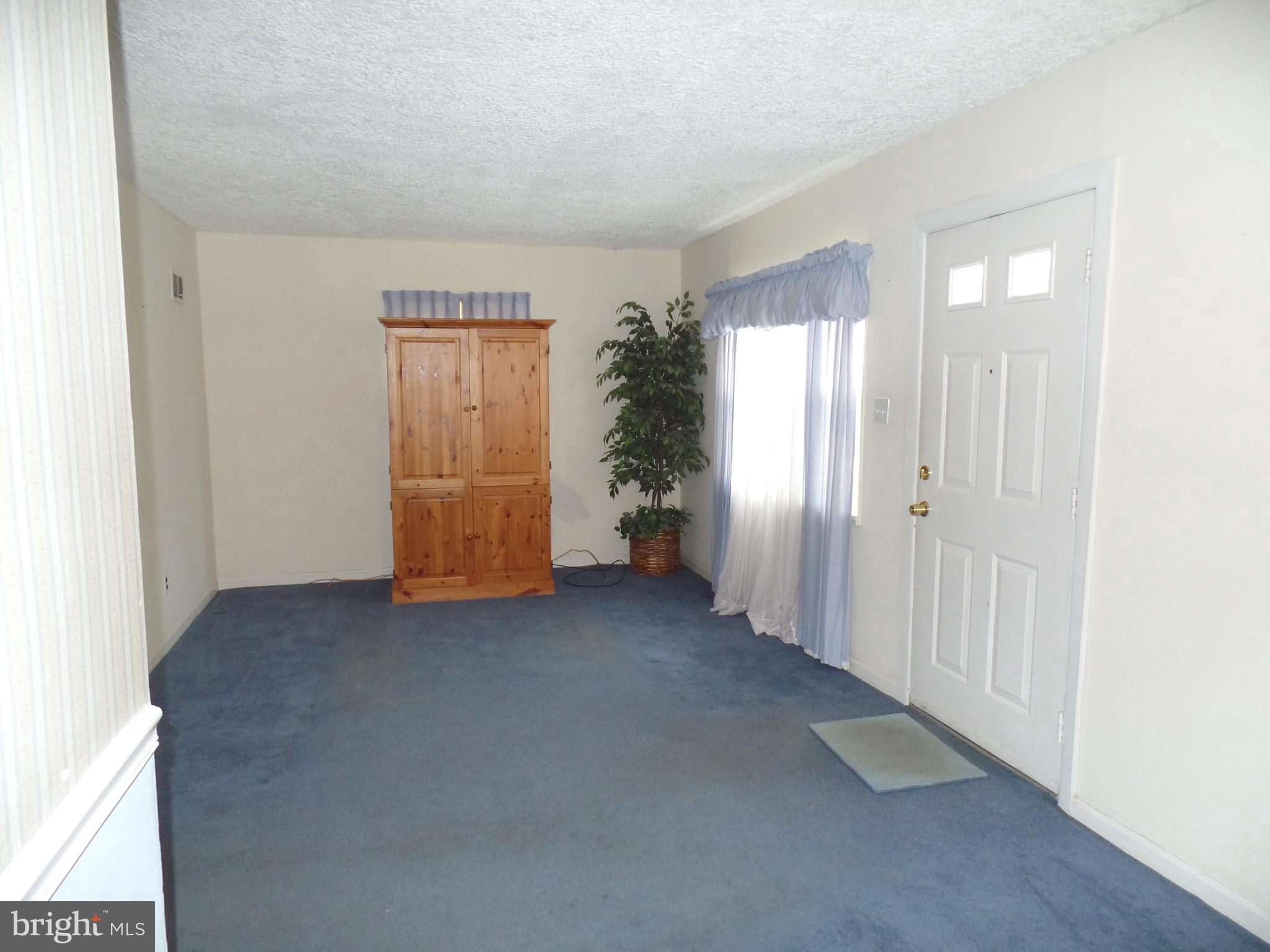 7403 Paxton Road Falls Church, VA 22043 - Photo 7 of 9 a view of an empty room with a window