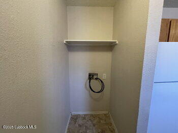 1512 82nd Street, Unit B Lubbock, TX 79423 - Photo 8 of 8 a bathroom with a sink
