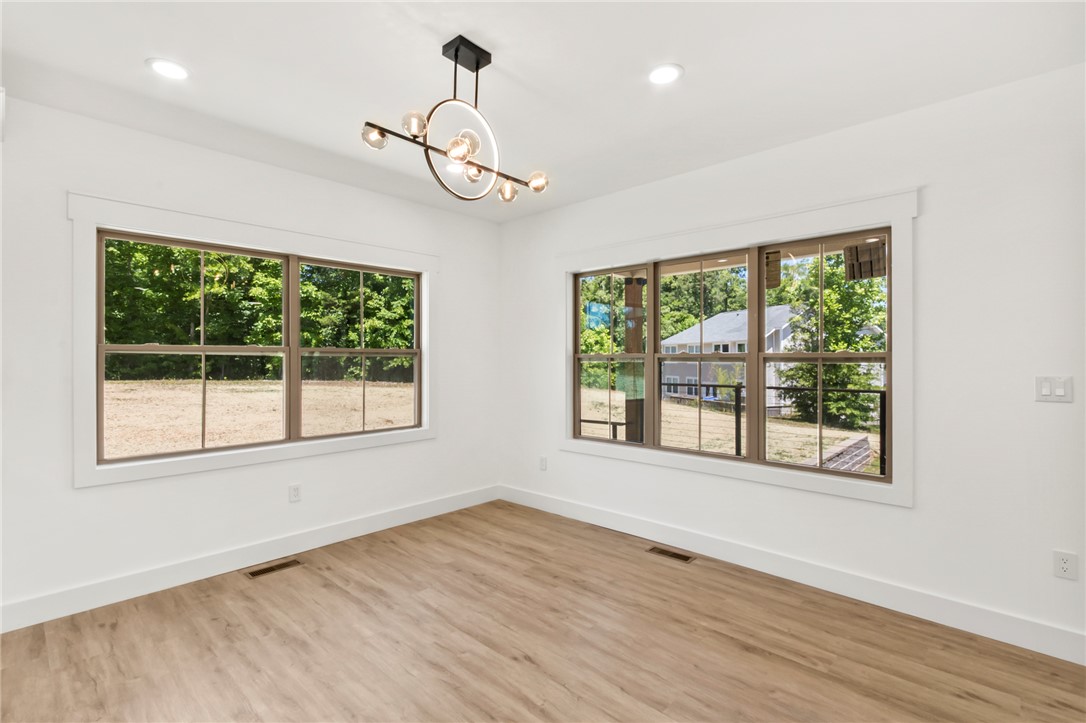230 Hammond Circle Anderson, SC 29621 - Photo 27 of 48 This bright space features ample natural light and durable flooring, ideal for versatile living.