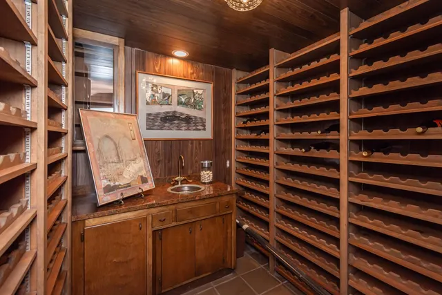 a view of an empty room with shelves