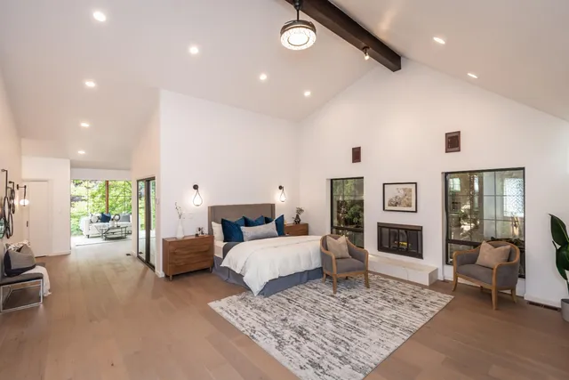 a living room with furniture and a rug